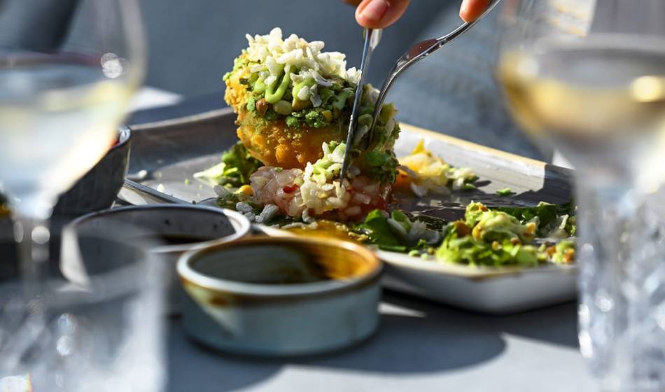 Shrimp with herbs and sauces on a plate, served with fresh ingredients, cut by one hand in #herrhoshi.