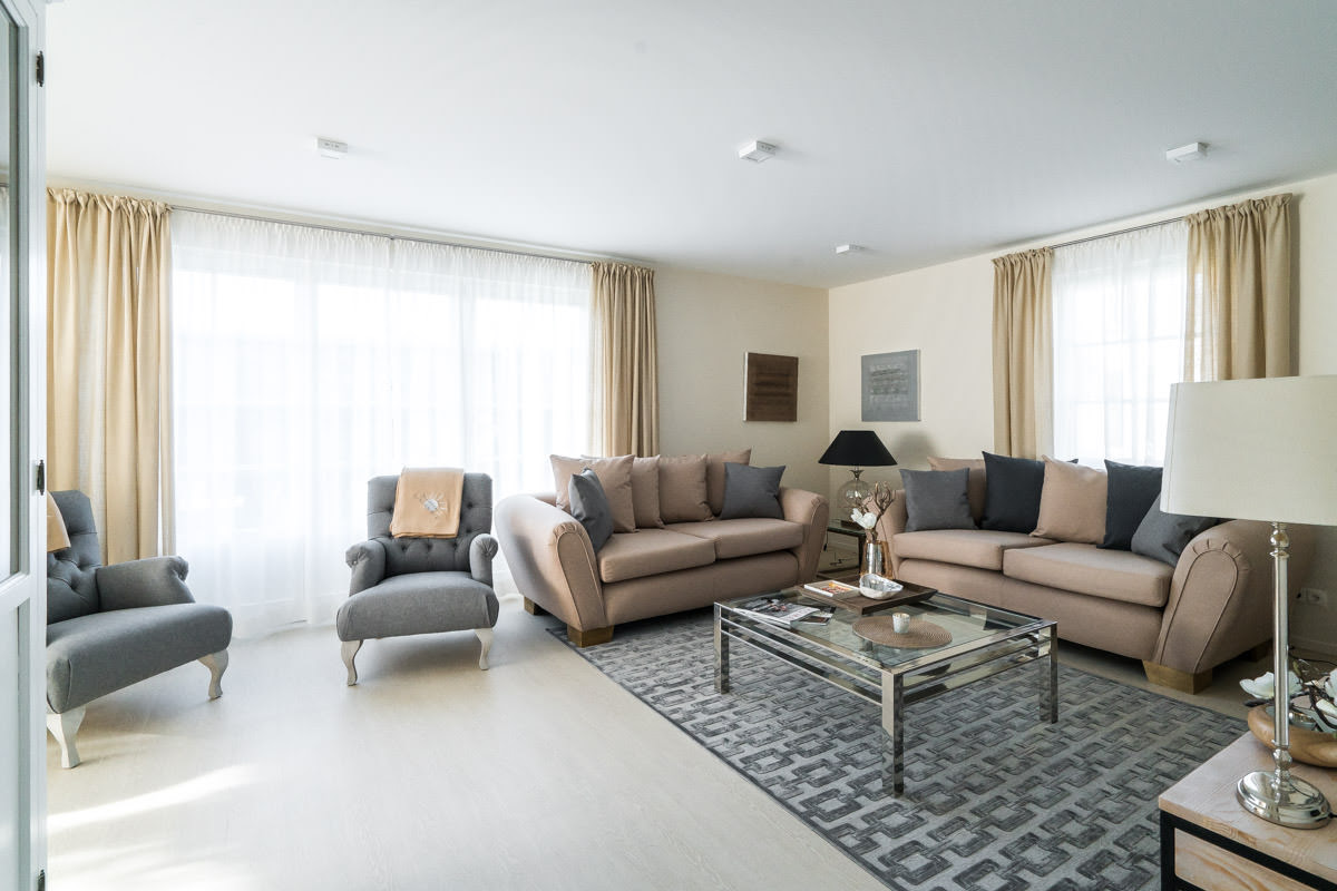 Wohnzimmer im Ferienhaus Sonneninsel, Teil des Hotel Seezeichen, perfekt für gesellige Abende und Entspannung in Ahrenshoop.